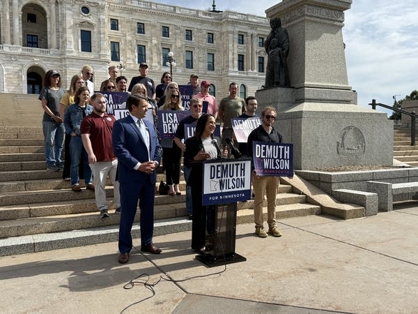 People talk on the Capitol steps