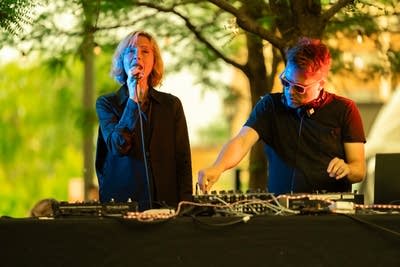 the band vaels performing on stage outdoors