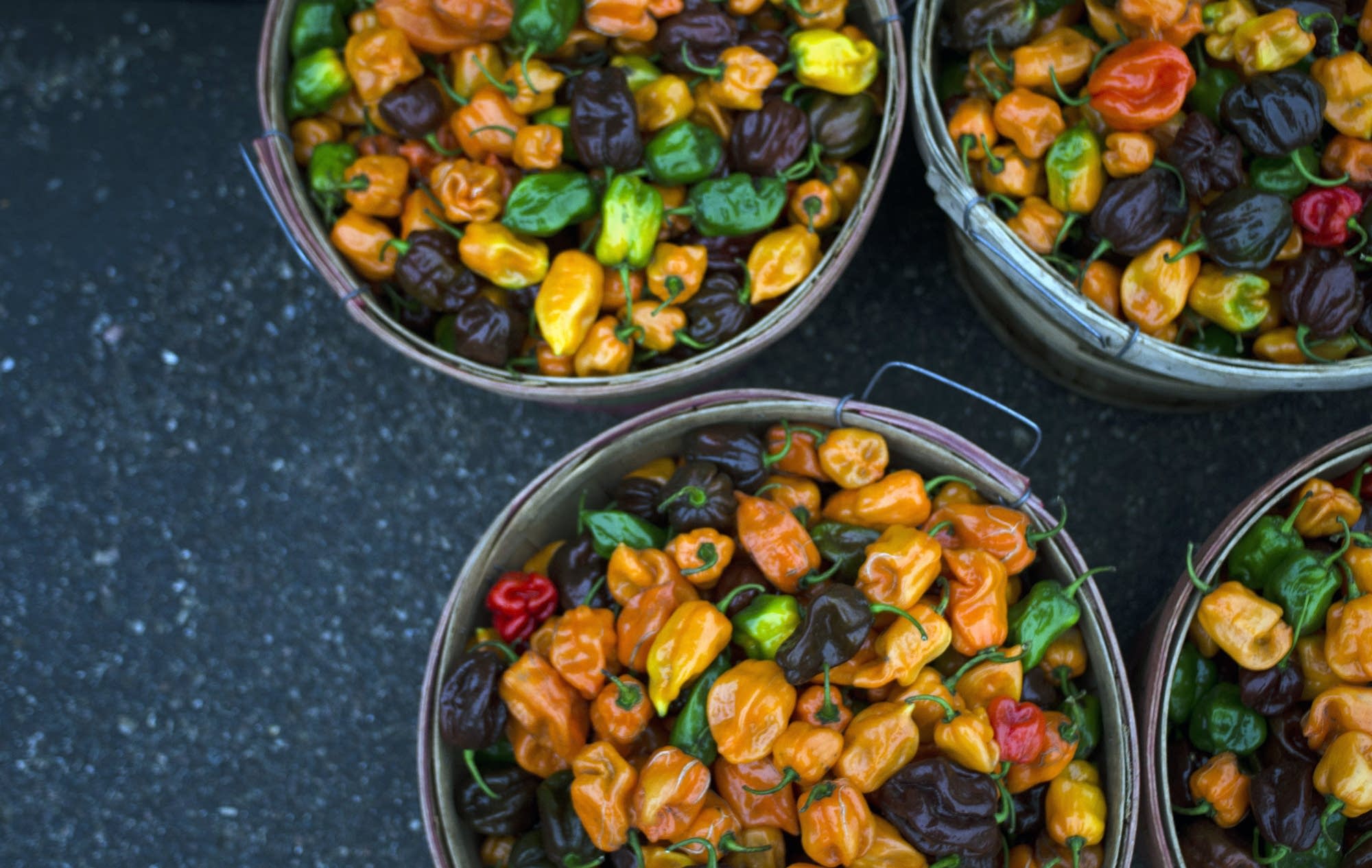 Baskets of habanero peppers at the Minneapolis market