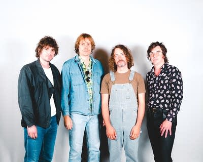 members of the band night moves pose for a photo