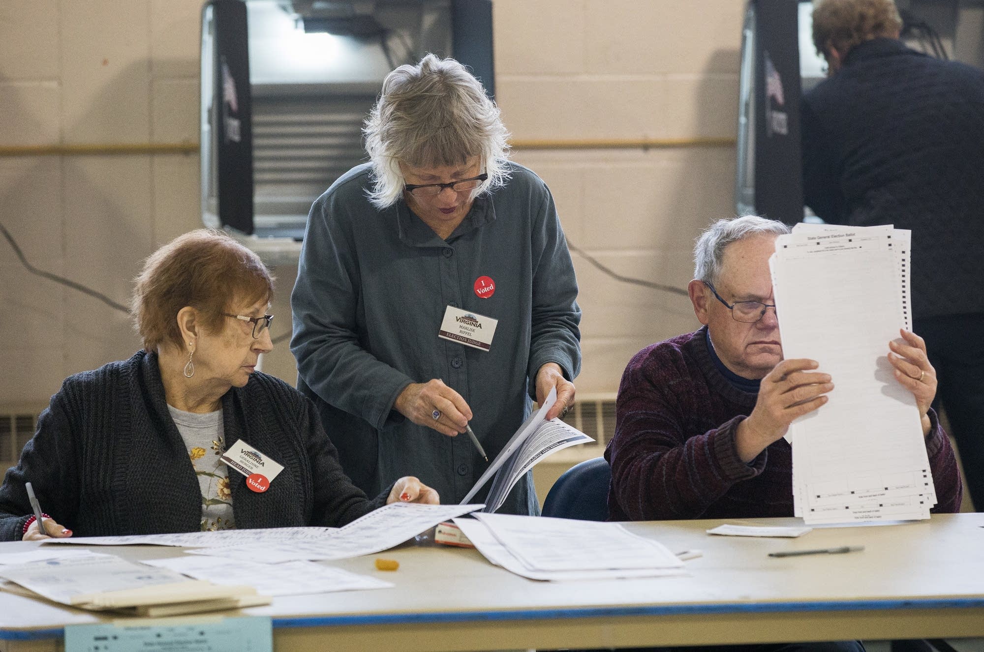 Election judges at the Miners Memorial Building in Virginia, Minn.