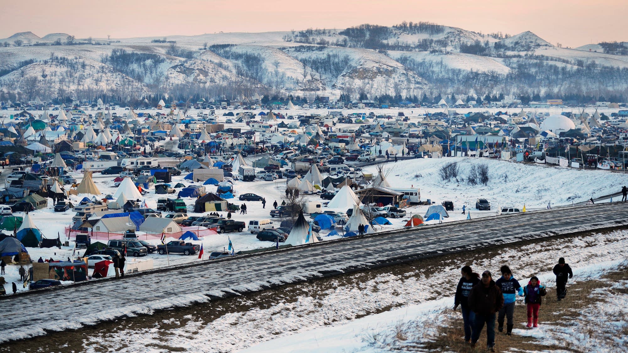 Years after oil pipeline protests, North Dakota and the federal government settle policing lawsuit