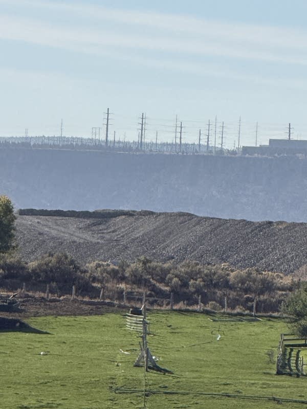 Meta's data center buildings tower over the Crooked River Valley near downtown Prineville