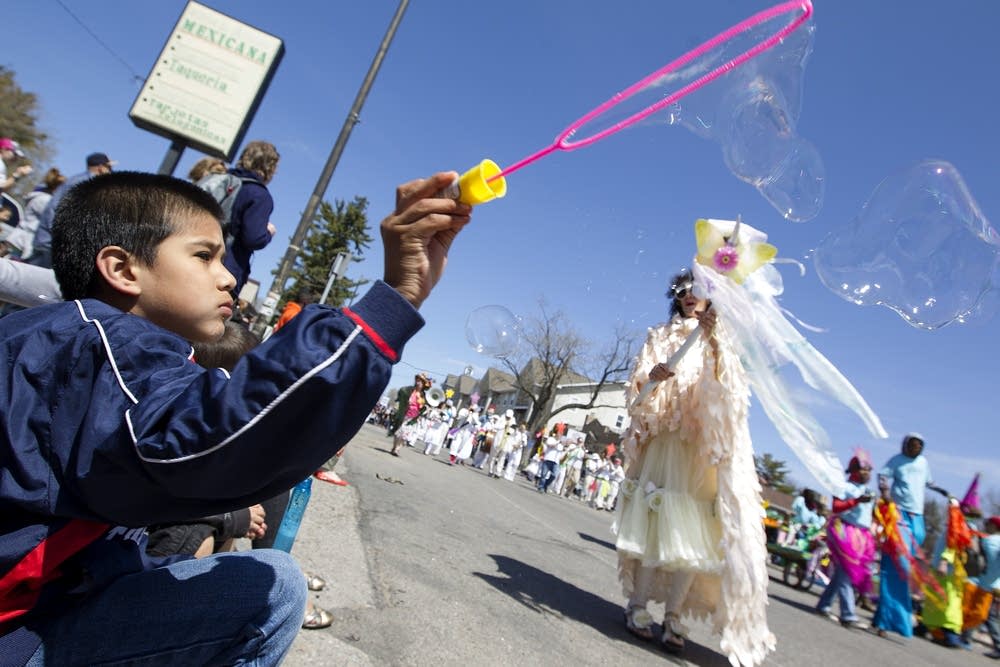 Javier Lopez Perez, 8, blows bubbles.