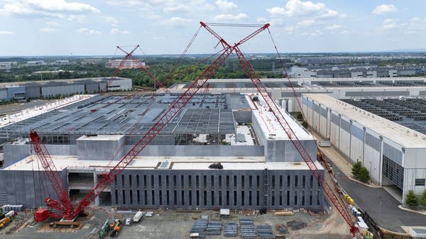 How much is the AI data center buildout driving economic growth?