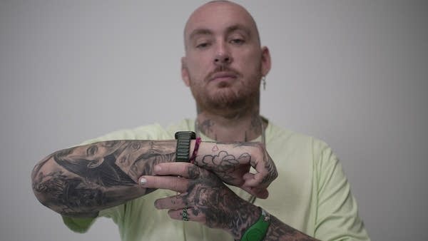 Celebrity tattoo artist Keith “Bang Bang” McCurdy shows a small, red heart tattoo created with Magic Ink.