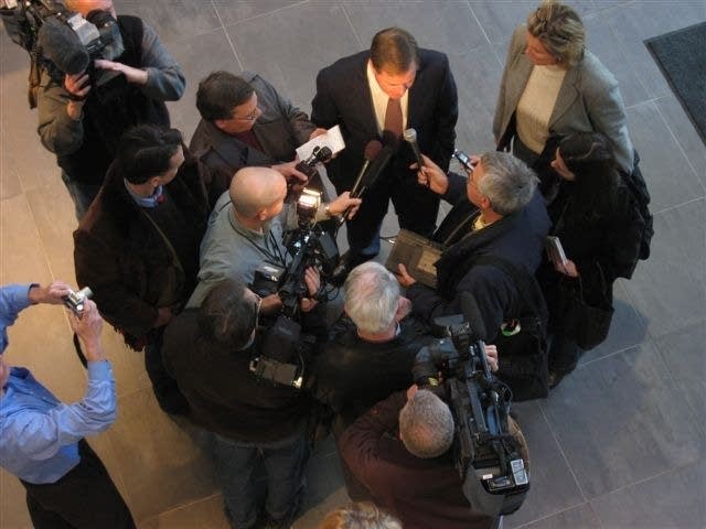 Hatch faces the media