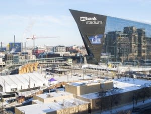 U.S. Bank Stadium looms over downtown Minneapolis last winter.