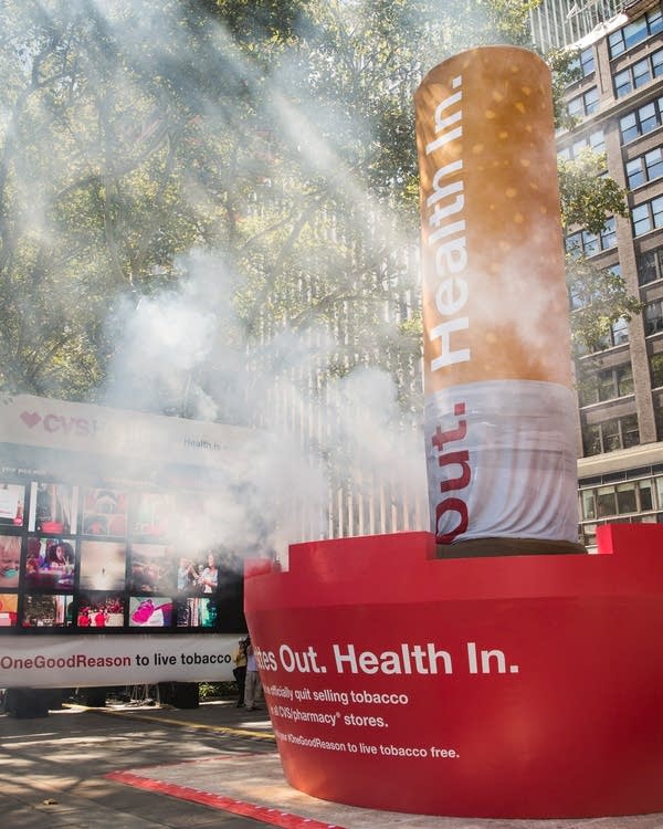 Drugstore chain CVS kicks tobacco habit a month early