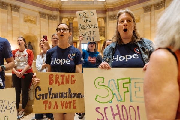 Protesters rally inside the Capitol.