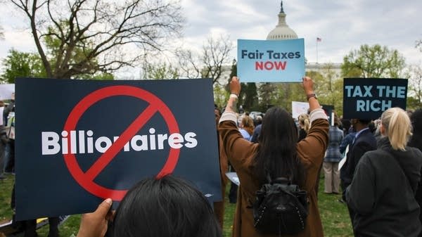 People attending a press conference and rally in support of fair taxation near the U.S. Capitol in Washington, D.C. in April 2025. 