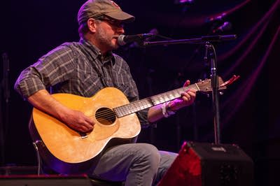 Grant Johnson performing on stage