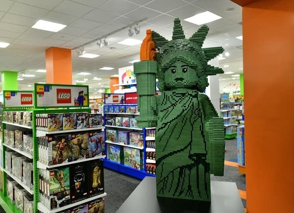 Toys R Us, which already had in-store partnerships with Macy's, is expanding its footprint amid the holiday season.