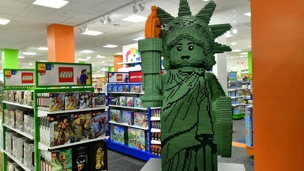 Toys R Us, which already had in-store partnerships with Macy's, is expanding its footprint amid the holiday season.