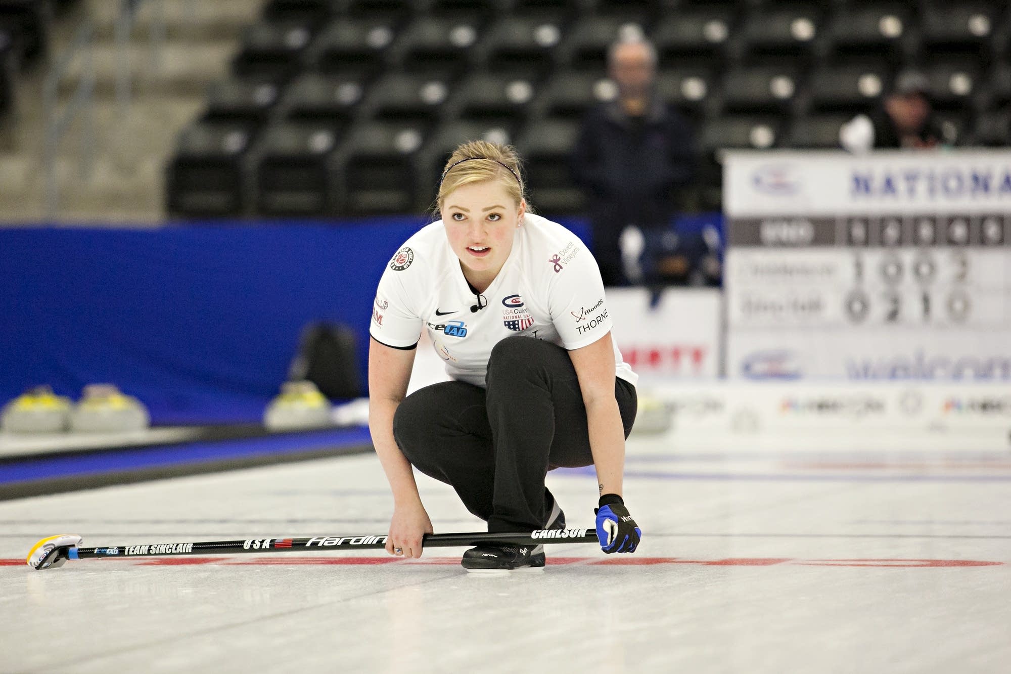 Alex Carlson keeps watch on a rock during the women's national title.