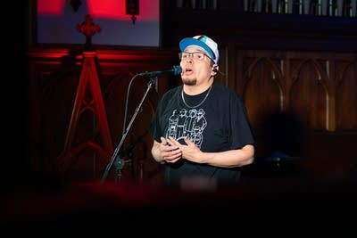 Man singing into microphone