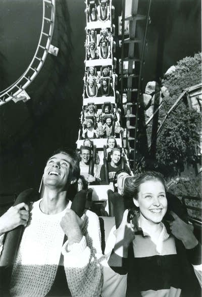 People going upside on corkscrew rollercoaster