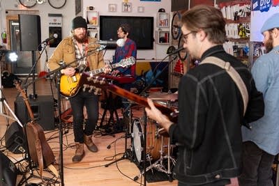 Band performing in store