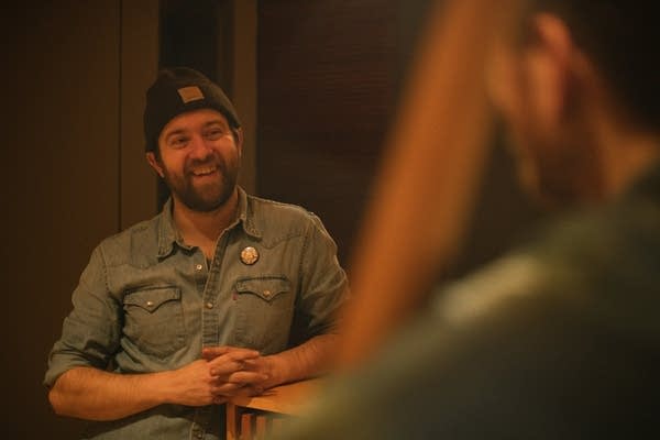 Sarah Morris's rhythm section, drummer Lars-Erik Larson and bassist Andrew Foreman, share a laugh ahead of a studio session at Radio Heartland.