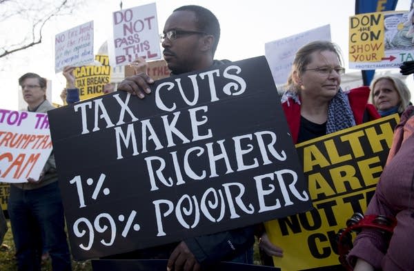 Demonstrators against the Republican tax reform bill hold a "Peoples Filibuster to Stop Tax Cuts for Billionaires," protest rally outside the US Capitol on Capitol Hill in Washington, DC, November 30, 2017.