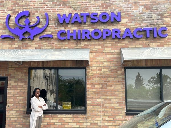 the front of a building with a sign that reads Watson Chiropractic