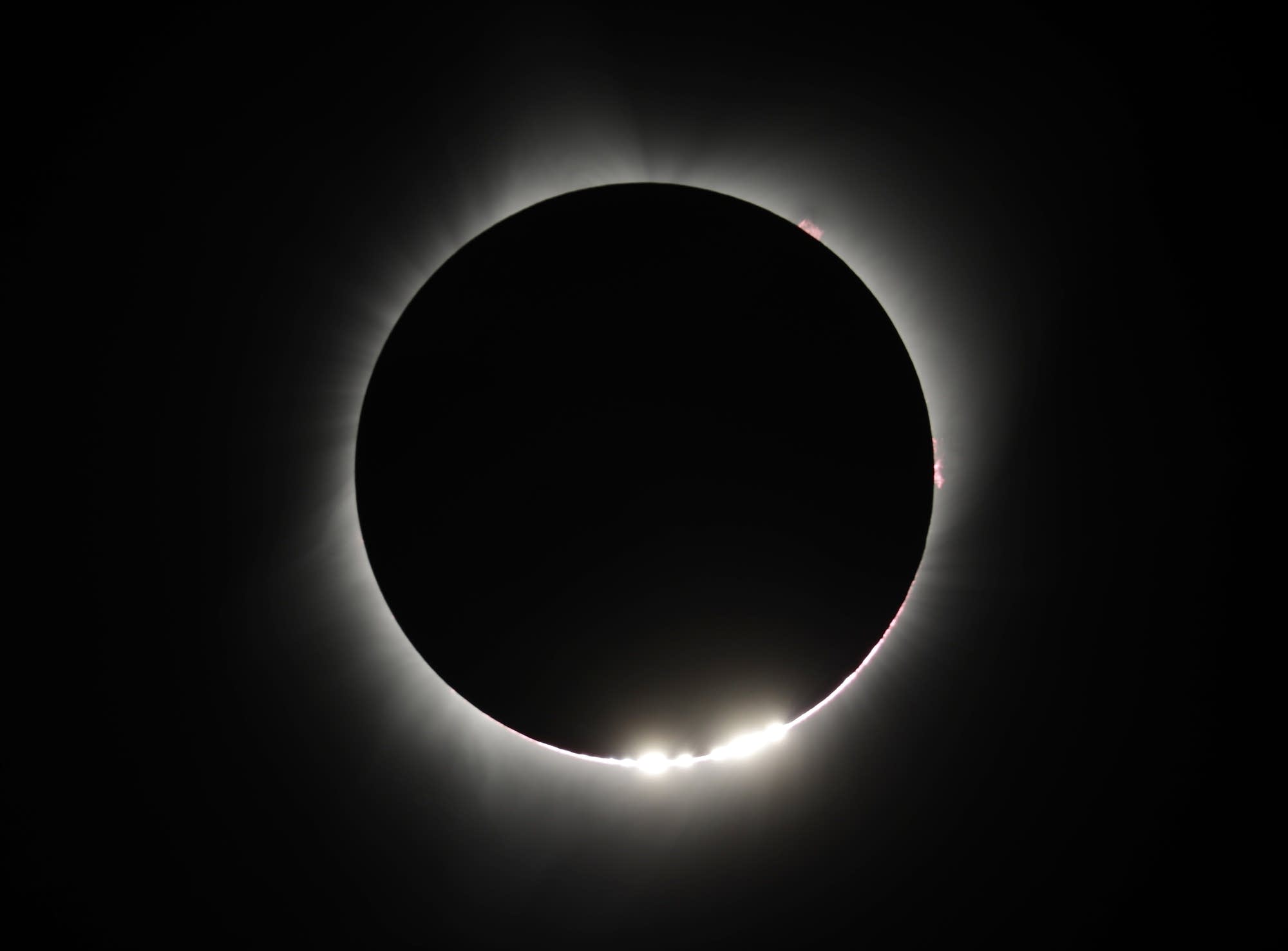 The moon covers the sun during a total eclipse near Redmond, Ore.
