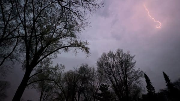 Lightning streaks across the sky 