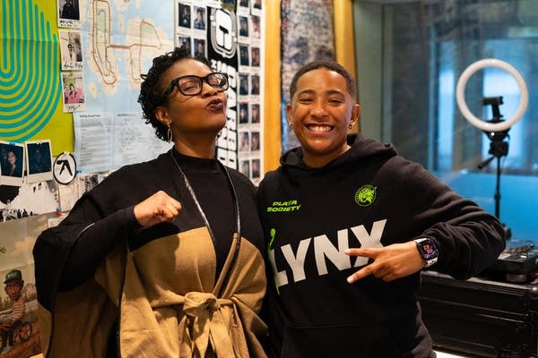 sanni brown and bdotcroc posing for a photo