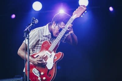 Benjamin Booker and one of his guitars.