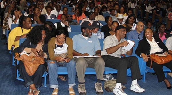 Job seekers waiting inside the Faith Dome at Crenshaw Christian Center in Los Angeles.