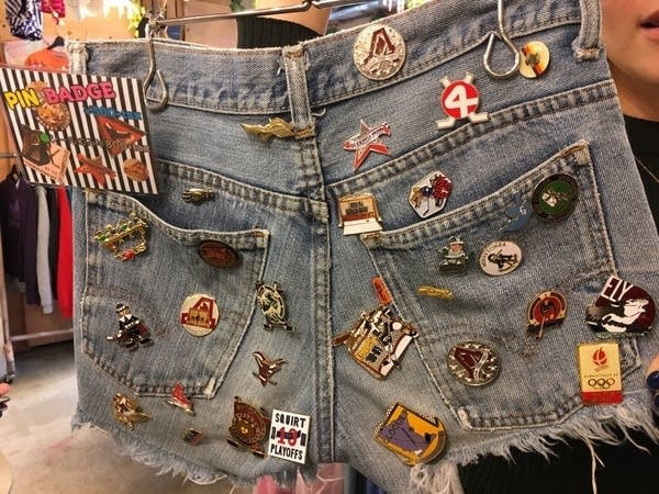 Mystery: How did MN hockey tournament pins end up on shorts in Tokyo?