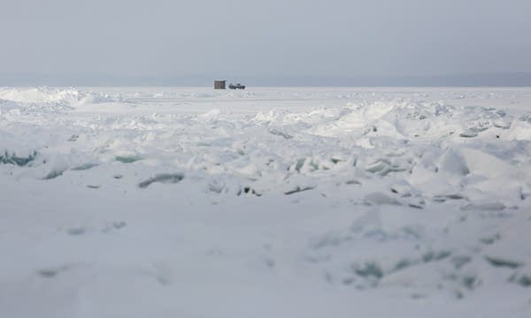 Odle moves an ice house onto Mille Lacs.