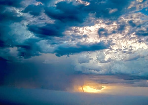 Near-record low brings rain, cooldown midweek