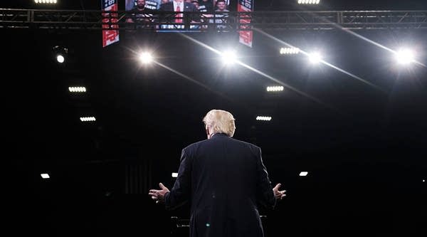 Presumptive Republican presidential candidate Donald Trump speaks at a rally on Friday. Trump has once again posed the question of why networks don't pay him to do their televised debates.