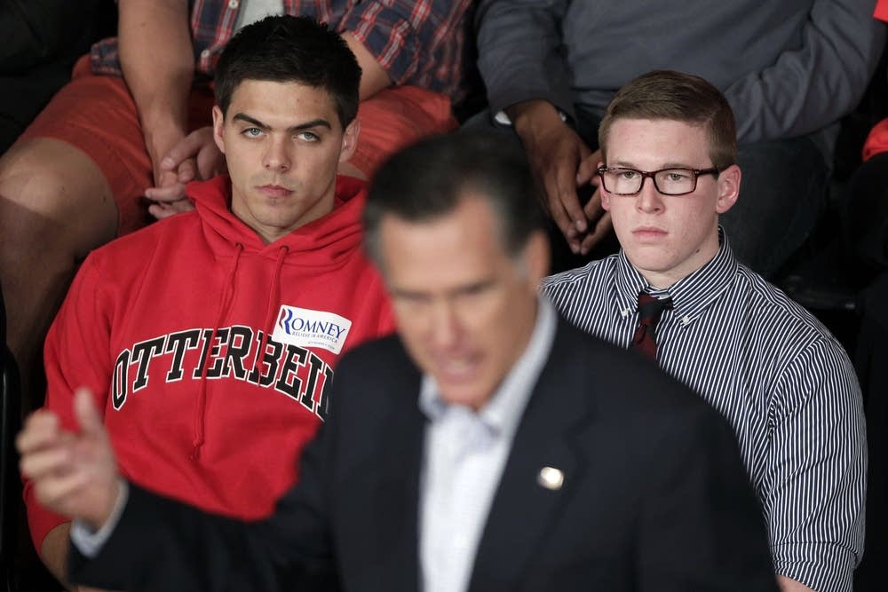 Students listen to Romney