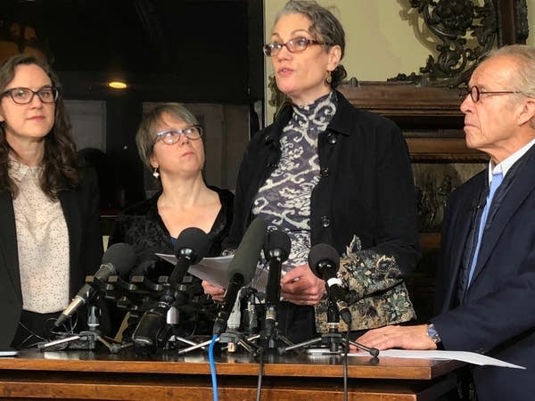 Laura Stearns, the plaintiff (second from right)