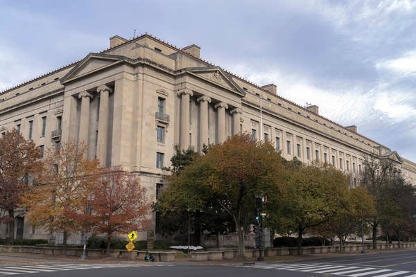 Wide shot of the exterior of the Department of Justice in Washington, D.C.
