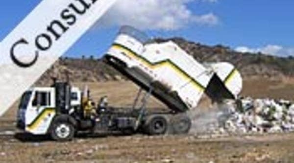 John Wilucz dumps his load of trash at the Puente Hills landfill in Southern California.