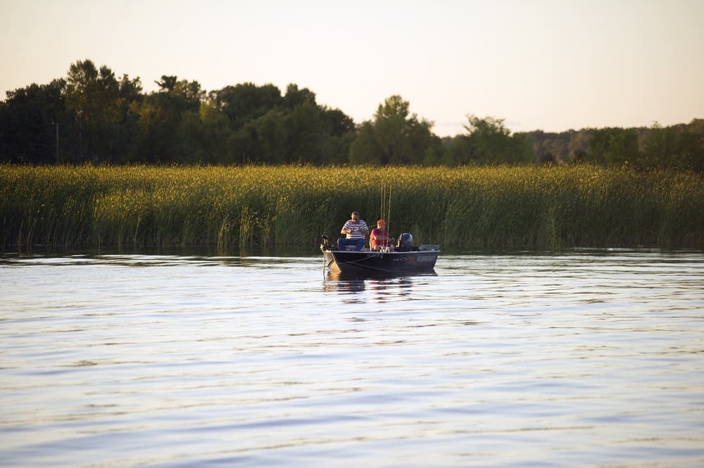 Two fisherman floated on Lake Mille Lacs.