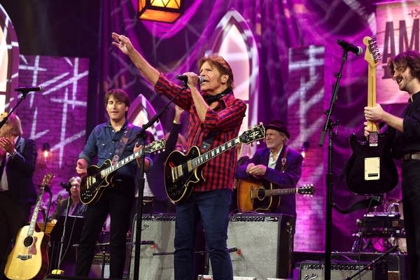 A band performing onstage