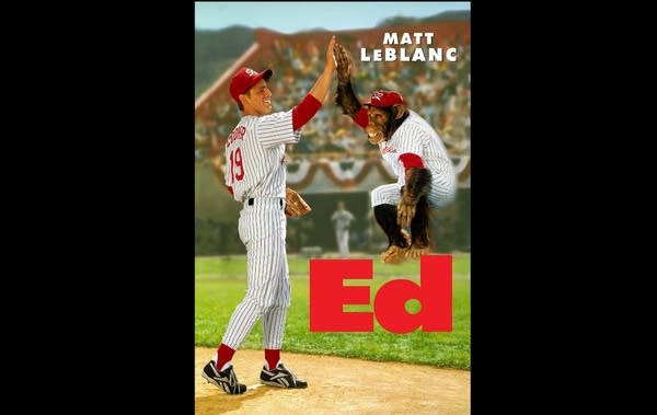 Movie poster for "Ed" showing baseball player hi-fiving monkey in uniform