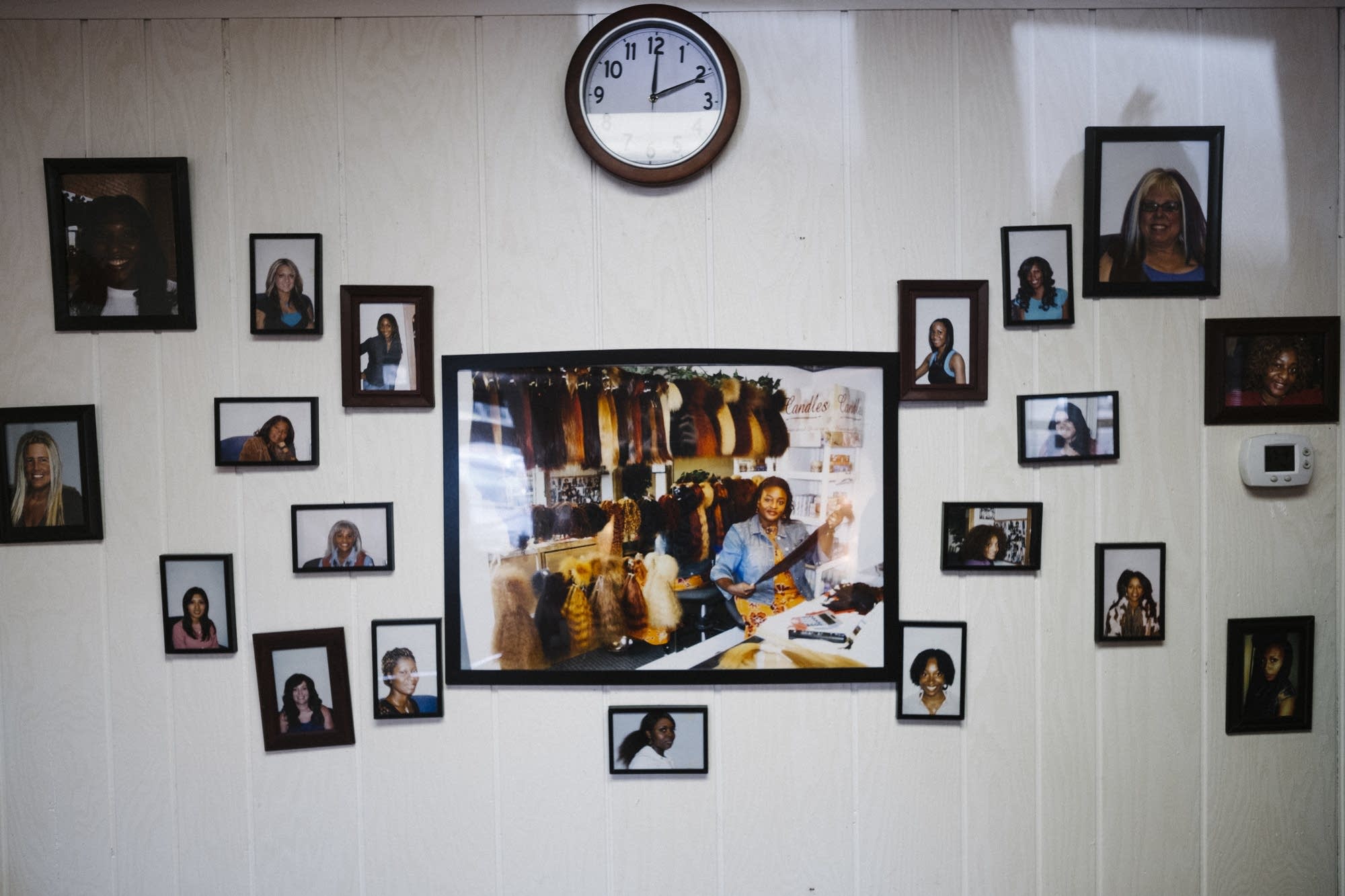 A photo of Joyce Iyawe is surrounded by photos of happy customers.