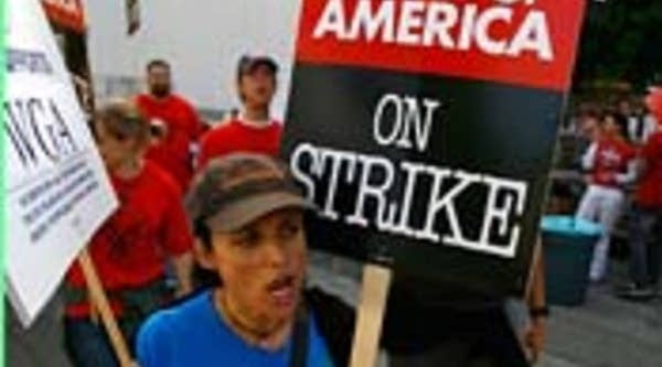 Actress Julia Louis-Dreyfus with the writers of her current show, "The New Adventures Of Old Christine," outside the set of "Desperate Housewives" in Los Angeles, California.