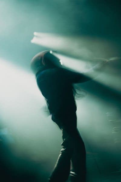 Liv.e performing on stage