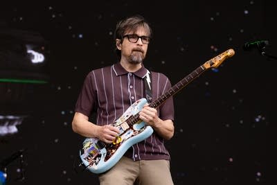the band weezer performing on stage