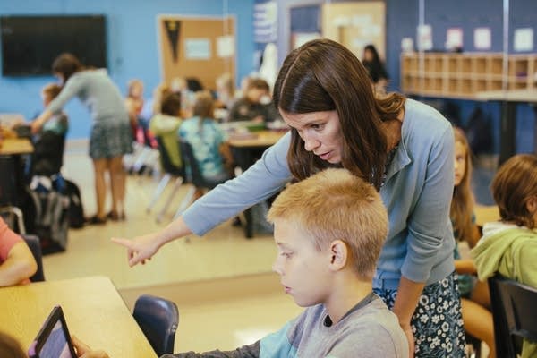 Cecilia Delbene assists 11-year-old Hayden Staloch.