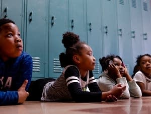 Lucy Laney students listen to instructions from Morgan McDonald Sr.