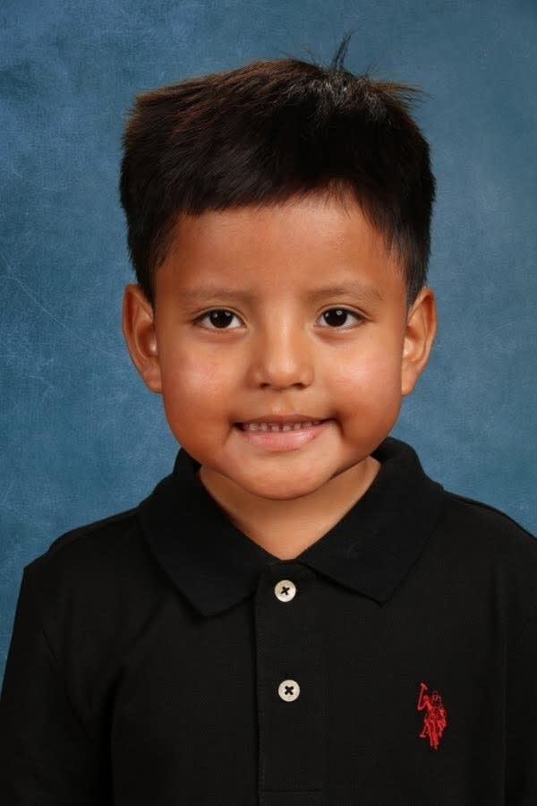 A school picture of a young boy.