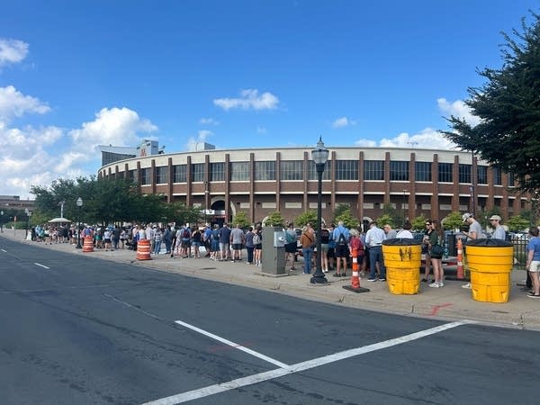 people wait in line