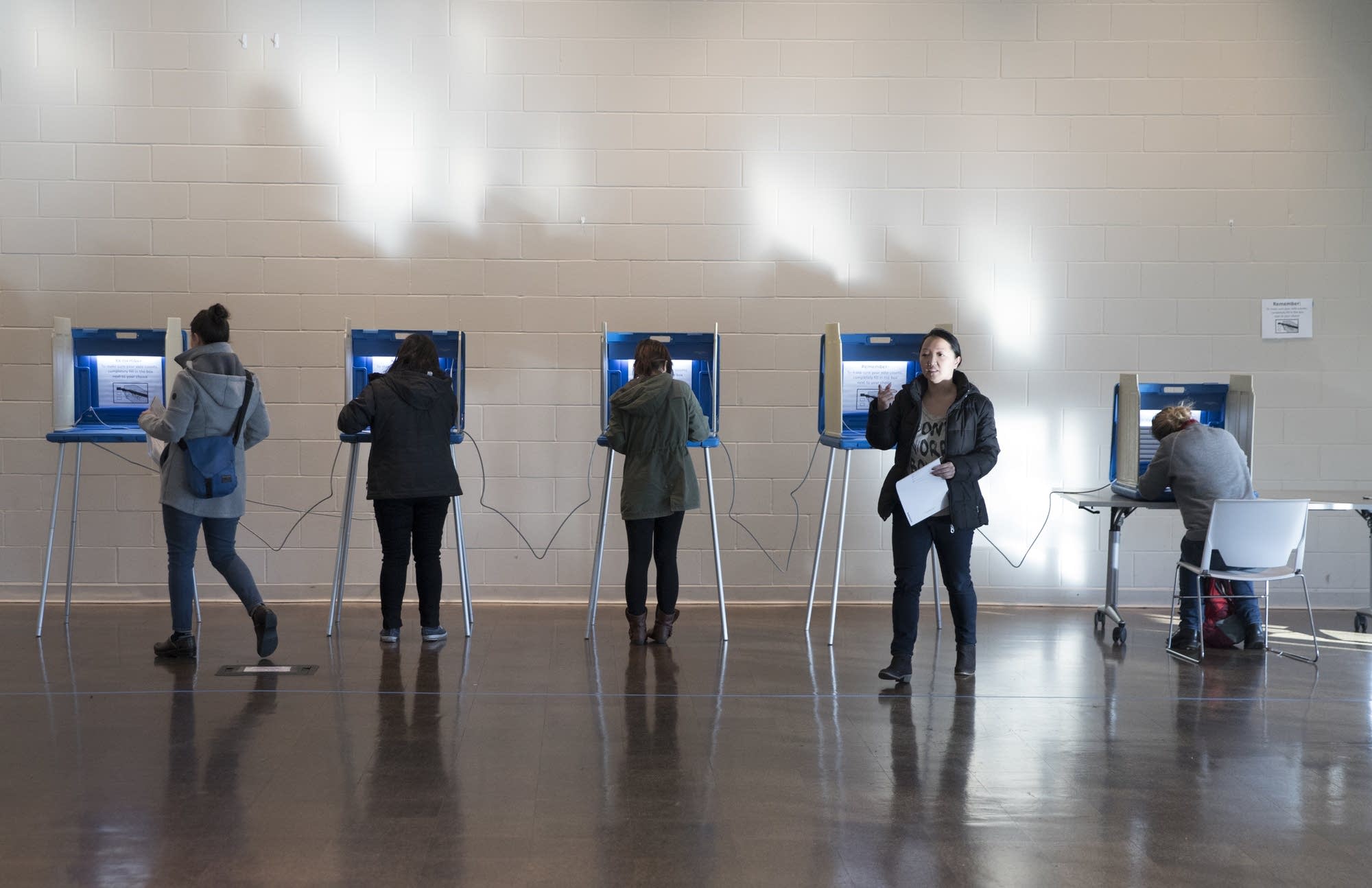Molly Yang heads to submit her ballot.